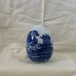 Blue and white ceramic egg